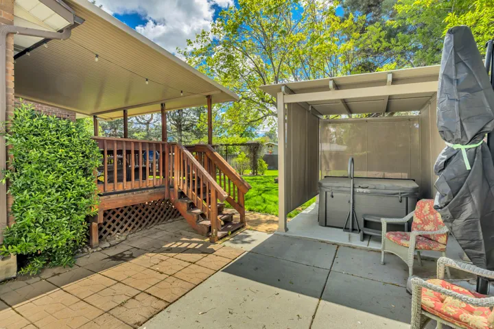 Covered outdoor deck with string lighting