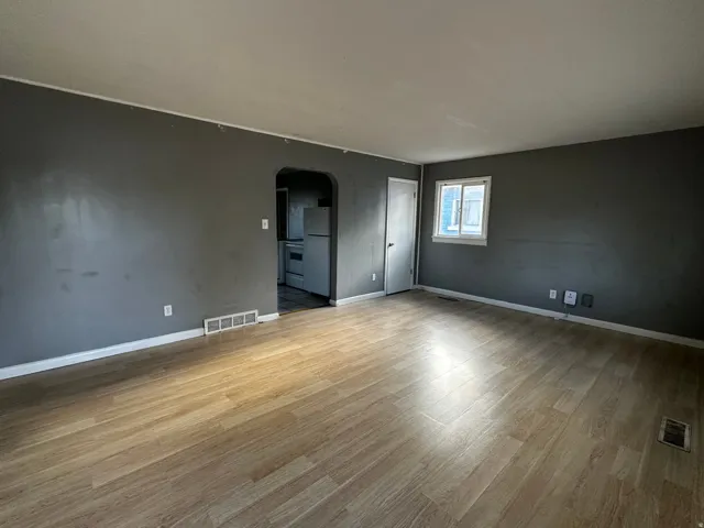 Wood-finish flooring with a neutral wall palette