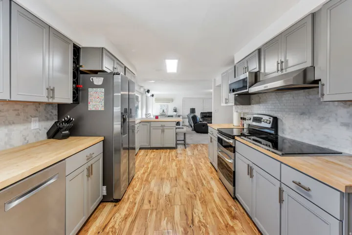 Sleek kitchen has modern finishes