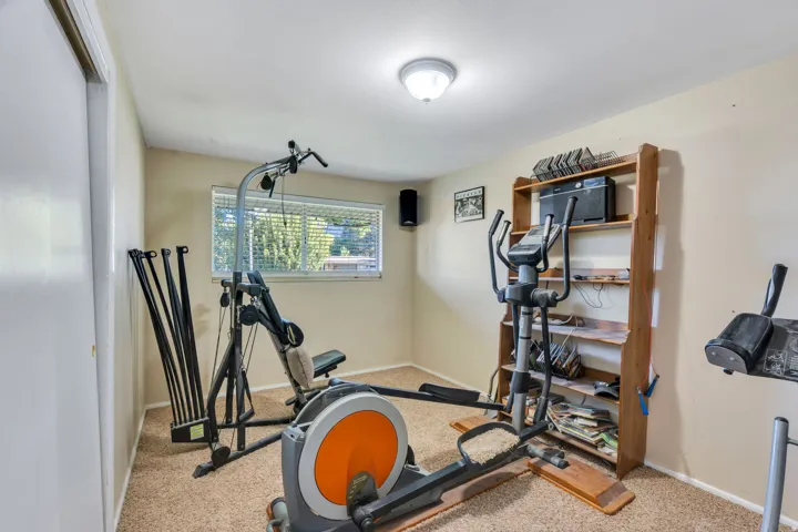 Bedroom #3 is being used as an exercise room