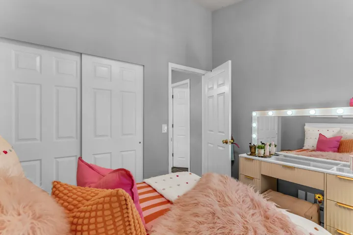 Vaulted ceiling with light gray painted walls