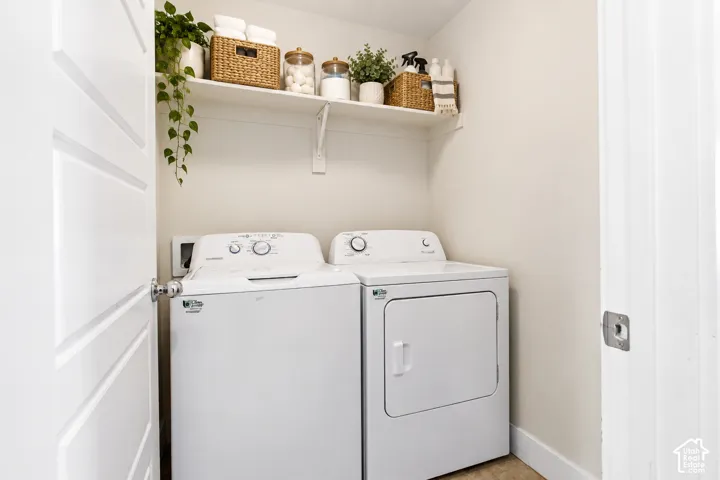 Laundry room with shelving