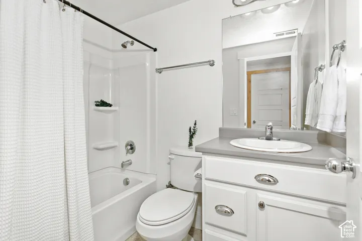 Basement bathroom with an integrated shower and tub combo