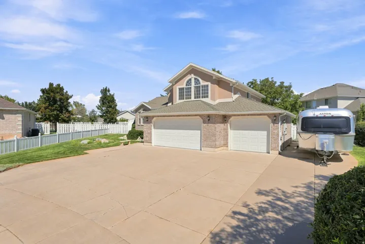 Brick veneer facade with a two-car garage