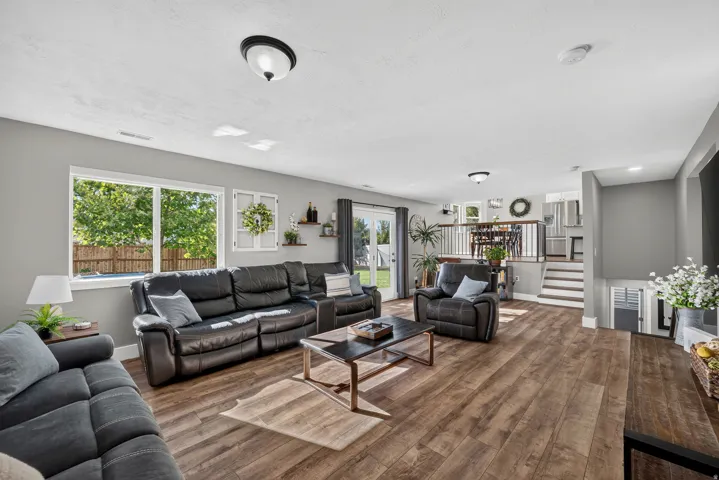 Wood-finish flooring throughout, with a window overlooking the exterior