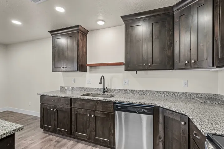 Dark wood-finish cabinetry with silver-tone hardware