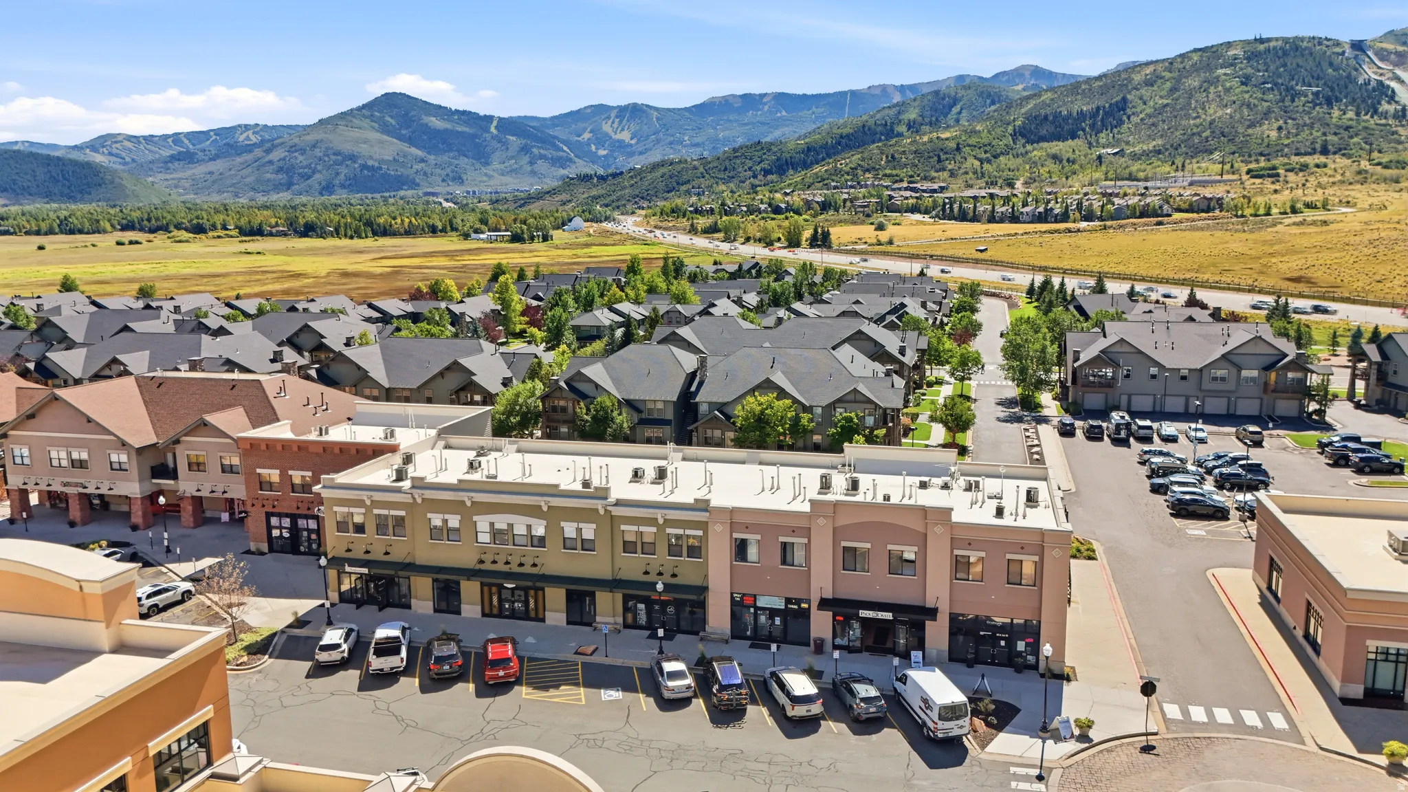 Mixed-use development featuring commercial storefronts and residential structures