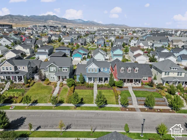 Residential community featuring diverse architectural styles and neatly maintained front yards