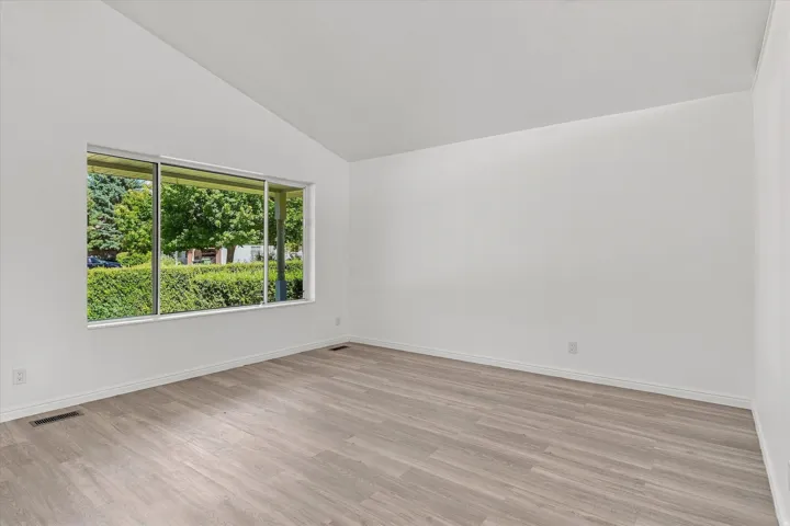 Vaulted ceilings over wood-finish flooring