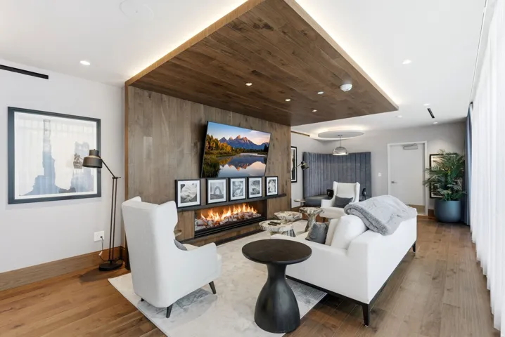 Wood-finish flooring with a linear electric fireplace