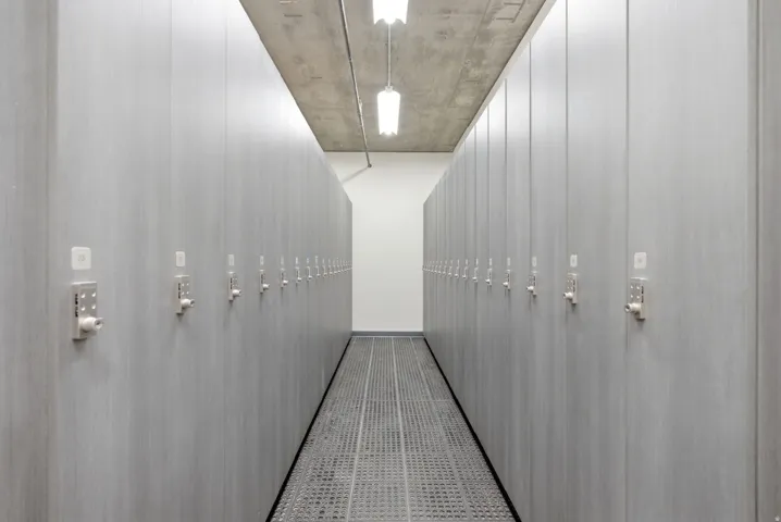 Parallel rows of individual storage lockers featuring digital locks