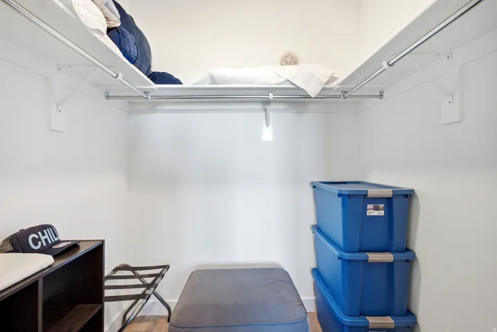 White walls with wood-finish flooring