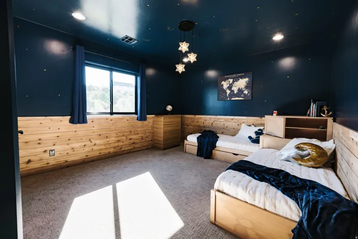 Wood-paneled wainscoting and wall-to-wall carpeting