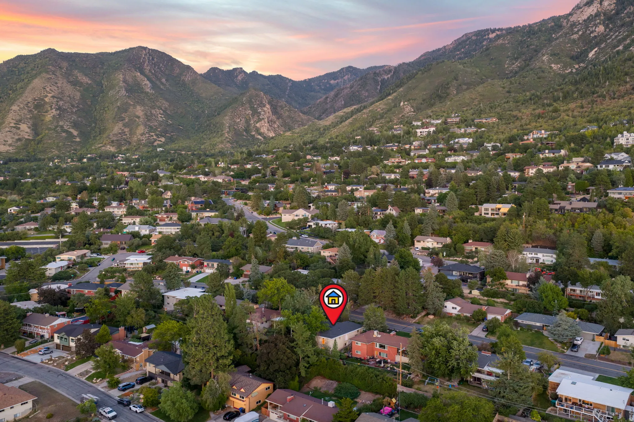 Ariel view of home and Mount Olympus backdrop