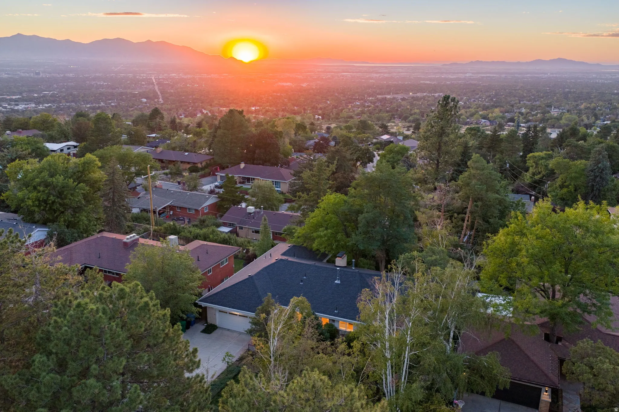 Ariel view of home and Salt Lake City backdrop