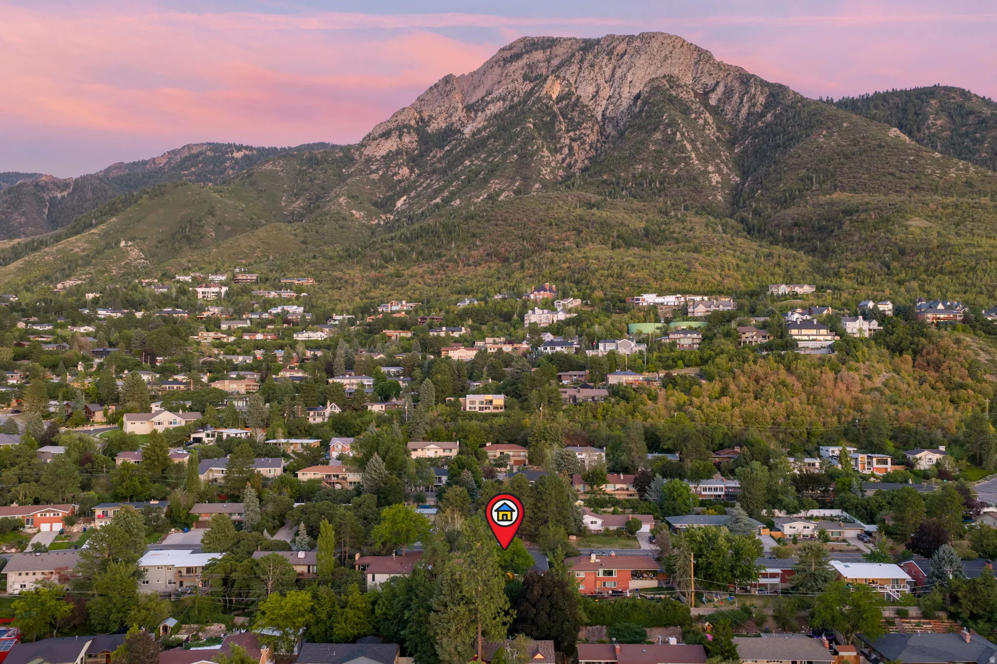 Ariel view of home and Mount Olympus backdrop