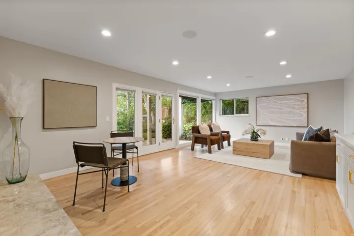 Lower level living room with walkout, wet bar and gas fireplace