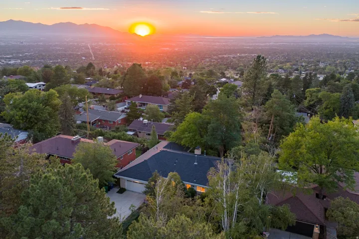 Ariel view of home and Salt Lake City backdrop