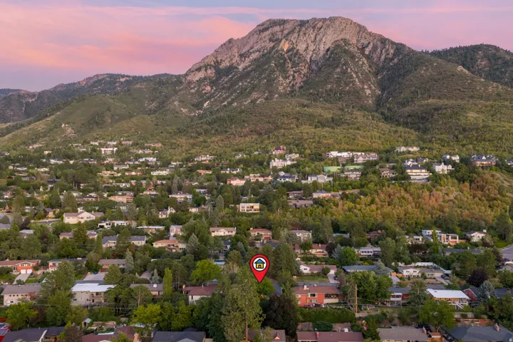 Ariel view of home and Mount Olympus backdrop