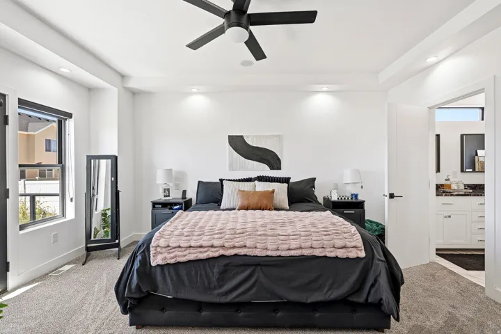 Recessed lighting, modern ceiling fan, and carpeted flooring
