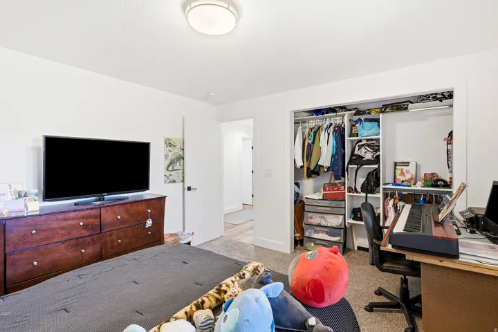 Recessed closet with integrated shelving and hanging rods