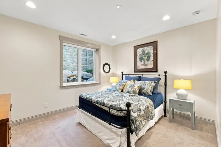 Wall-to-wall carpeting and recessed lighting