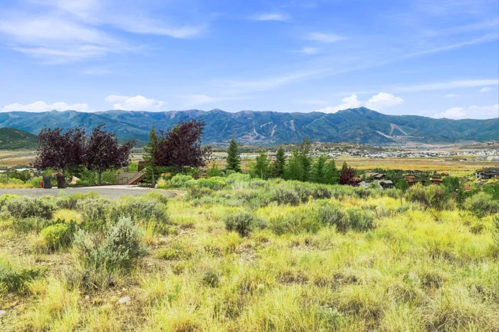 Expansive mountain backdrop with a natural landscape