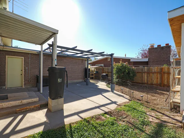 Patio leading to back garage door.