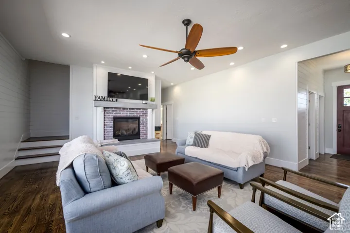 Hardwood-finish flooring, recessed lighting, and a ceiling fan