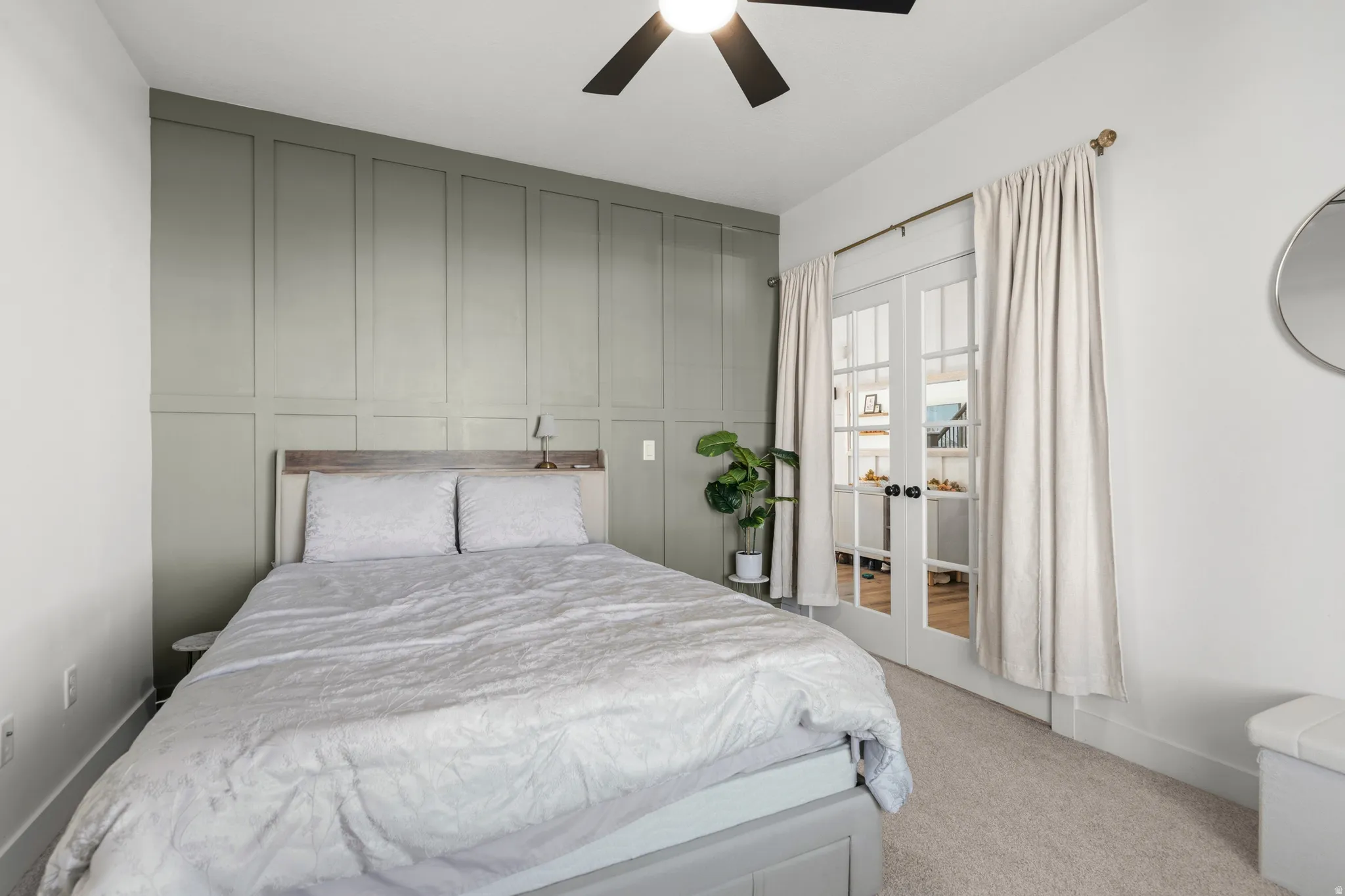 Accent wall featuring panel molding