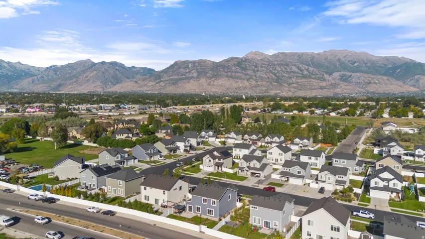 Residential community featuring uniform rooflines and varied exterior finishes