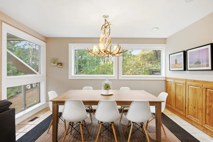 Expansive windows offer a light and bright Dining Area