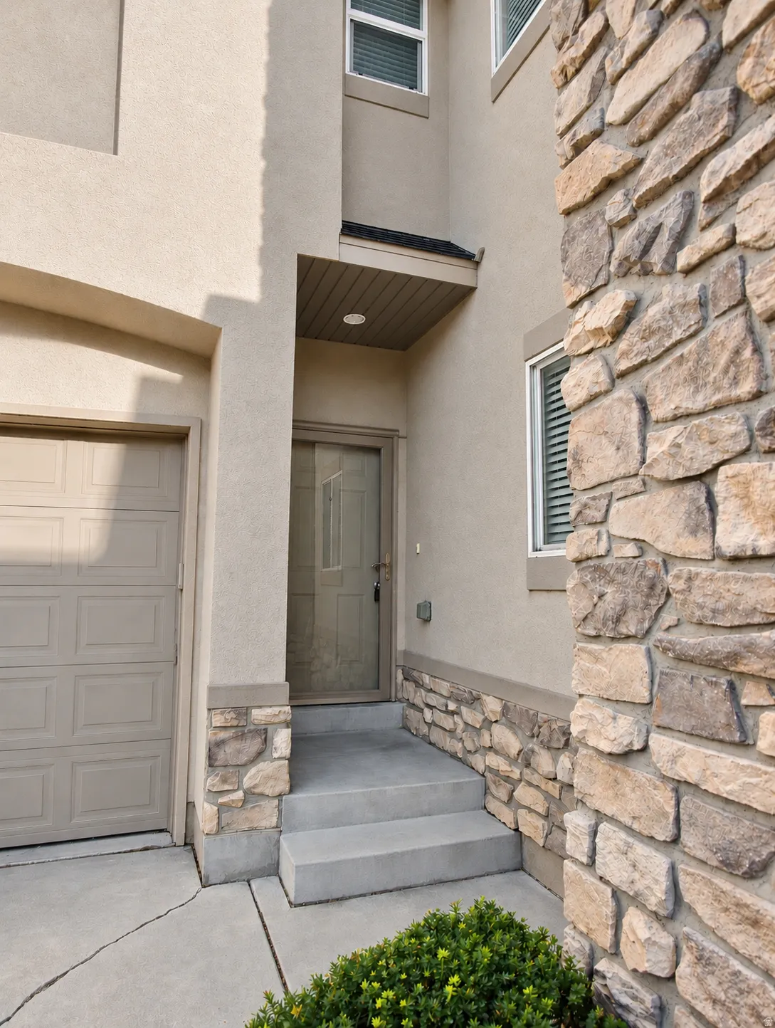 Storm door at entry