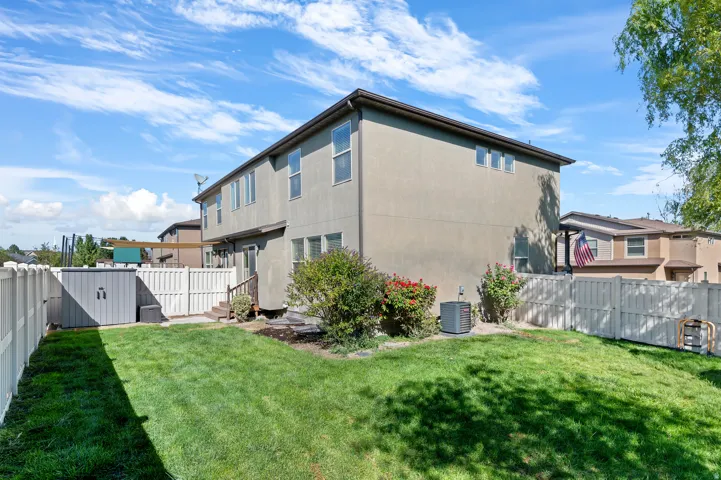 Manicured lawn with a privacy fence