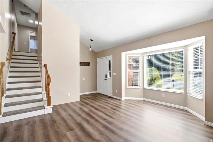 Wood-finish flooring throughout the main level