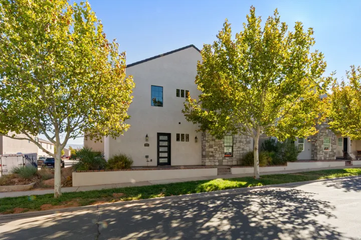 Contemporary exterior with stucco and stone accents