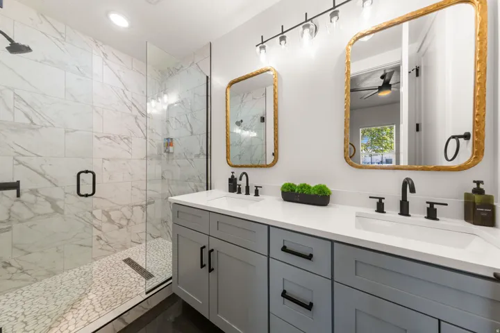 Dual vanity with integrated sinks and matte black fixtures
