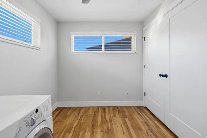Wood-finish flooring with white walls