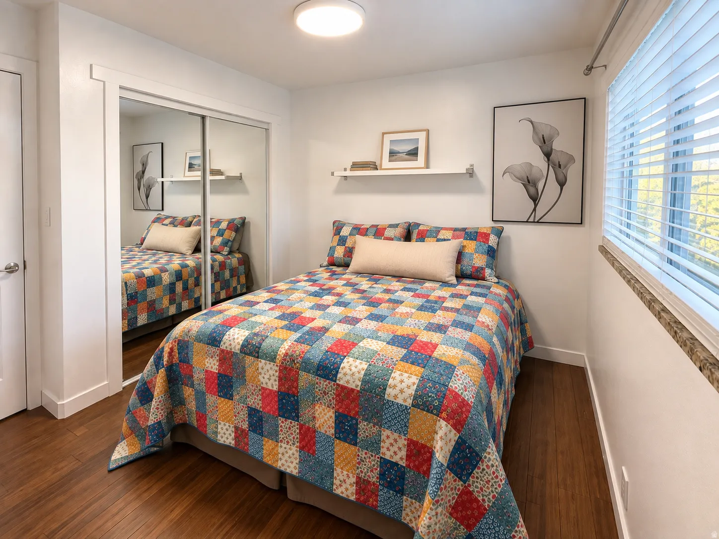 Bedroom 2, Wood-finish flooring, mirrored closet doors, a built-in window ledge, and a ceiling-mounted light fixture