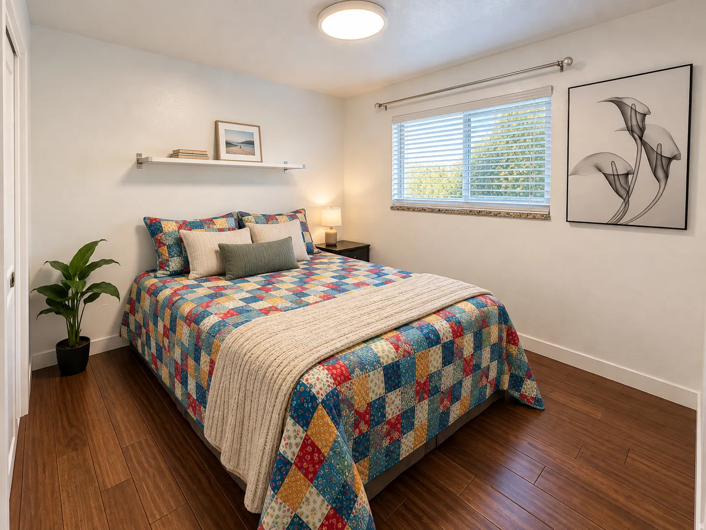 Master bedroom, Wood-finish flooring, recessed ceiling light, window with blinds, and a built-in wall shelf