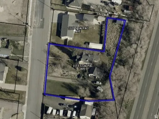 Aerial Map. Outlining the boundaries of the property and surrounding parcels