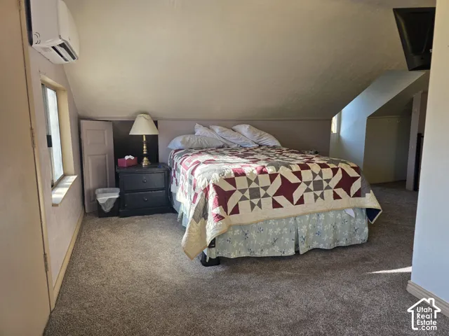 Wall-mounted air conditioning unit, window, and wall-mounted television