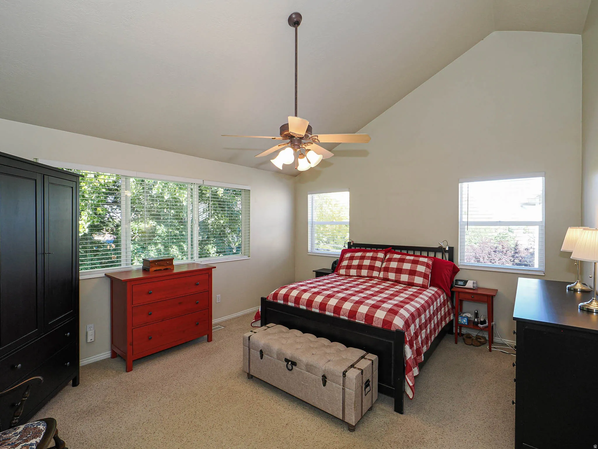 Primary with vaulted ceilings.