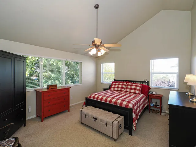Primary with vaulted ceilings.