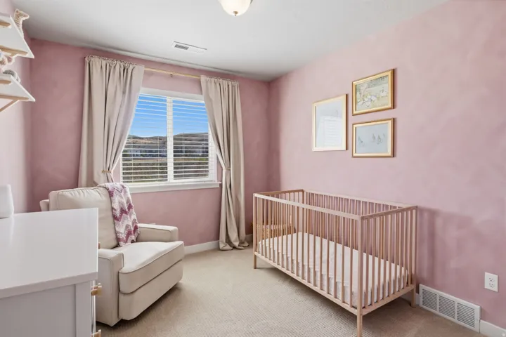 Window with horizontal blinds, wall-to-wall carpeting, and overhead lighting