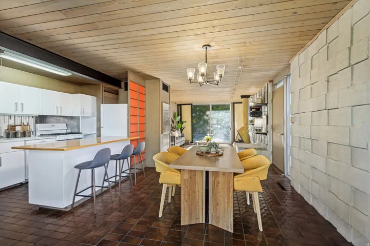 Wood-plank ceiling with recessed lighting