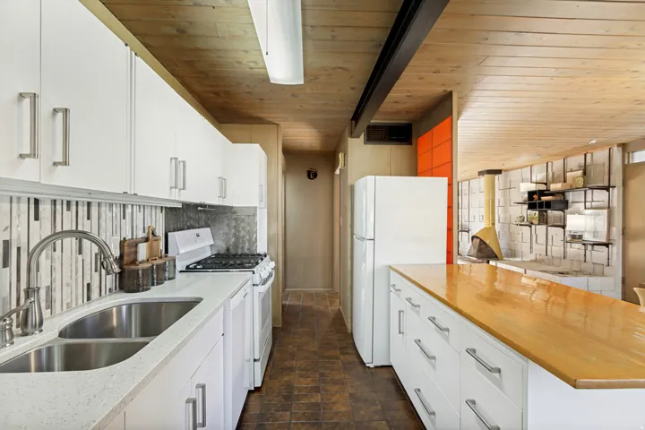 White cabinetry with brushed nickel hardware