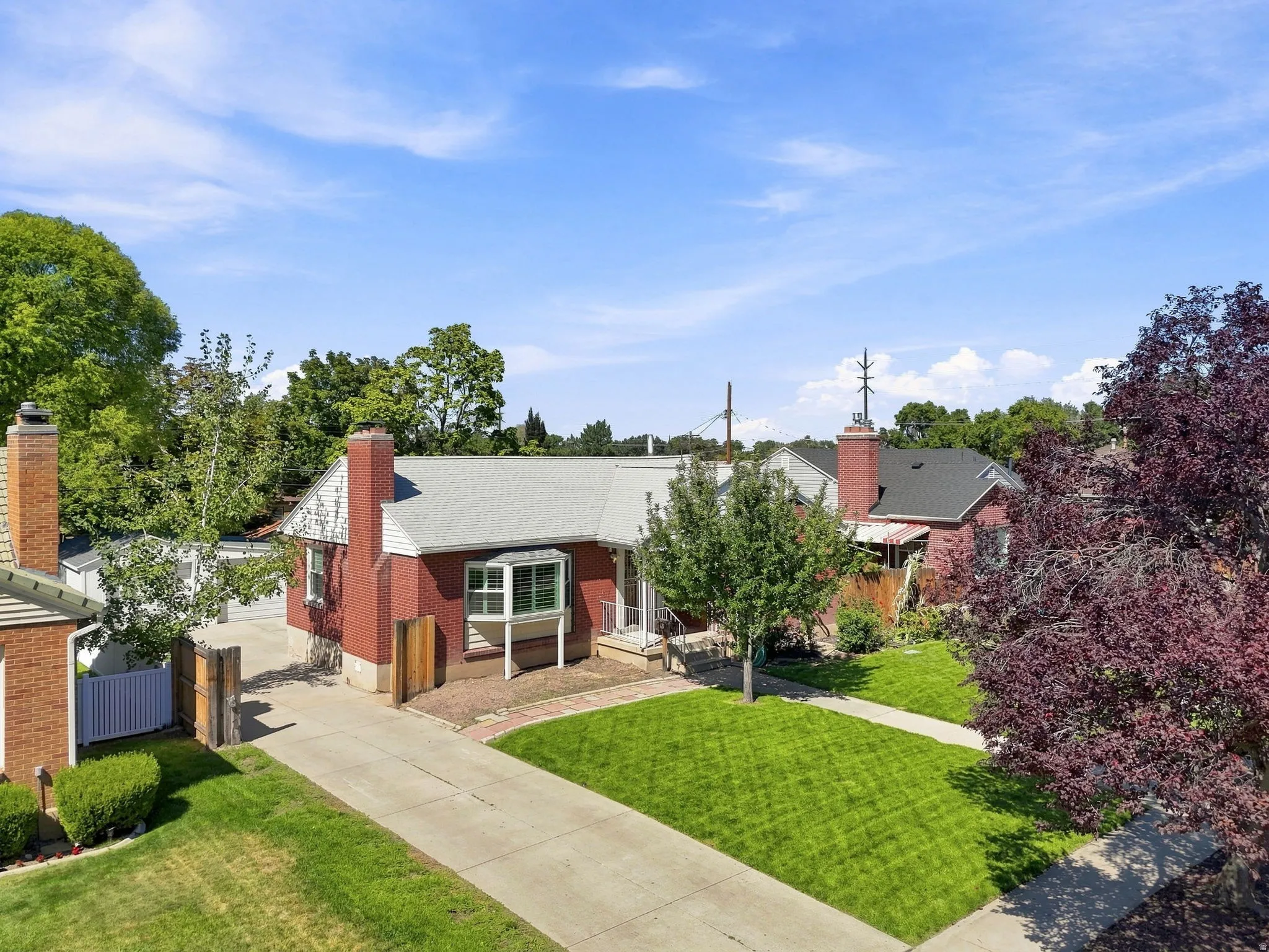 Red brick exterior with white trim