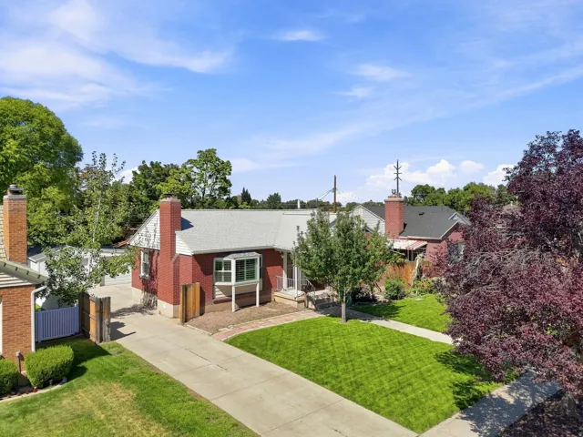 Red brick exterior with white trim