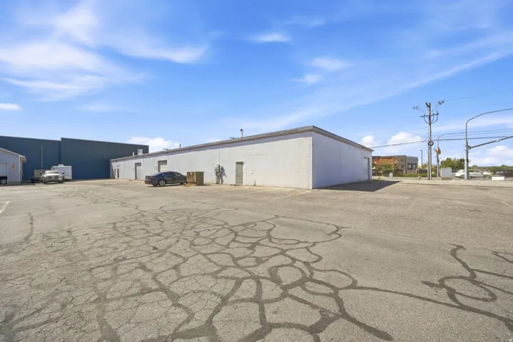 Expansive paved lot with multiple buildings